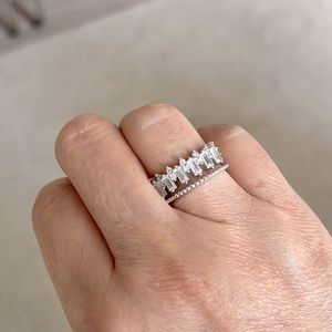 Beautiful white gold plated adjustable diamond looking ring.